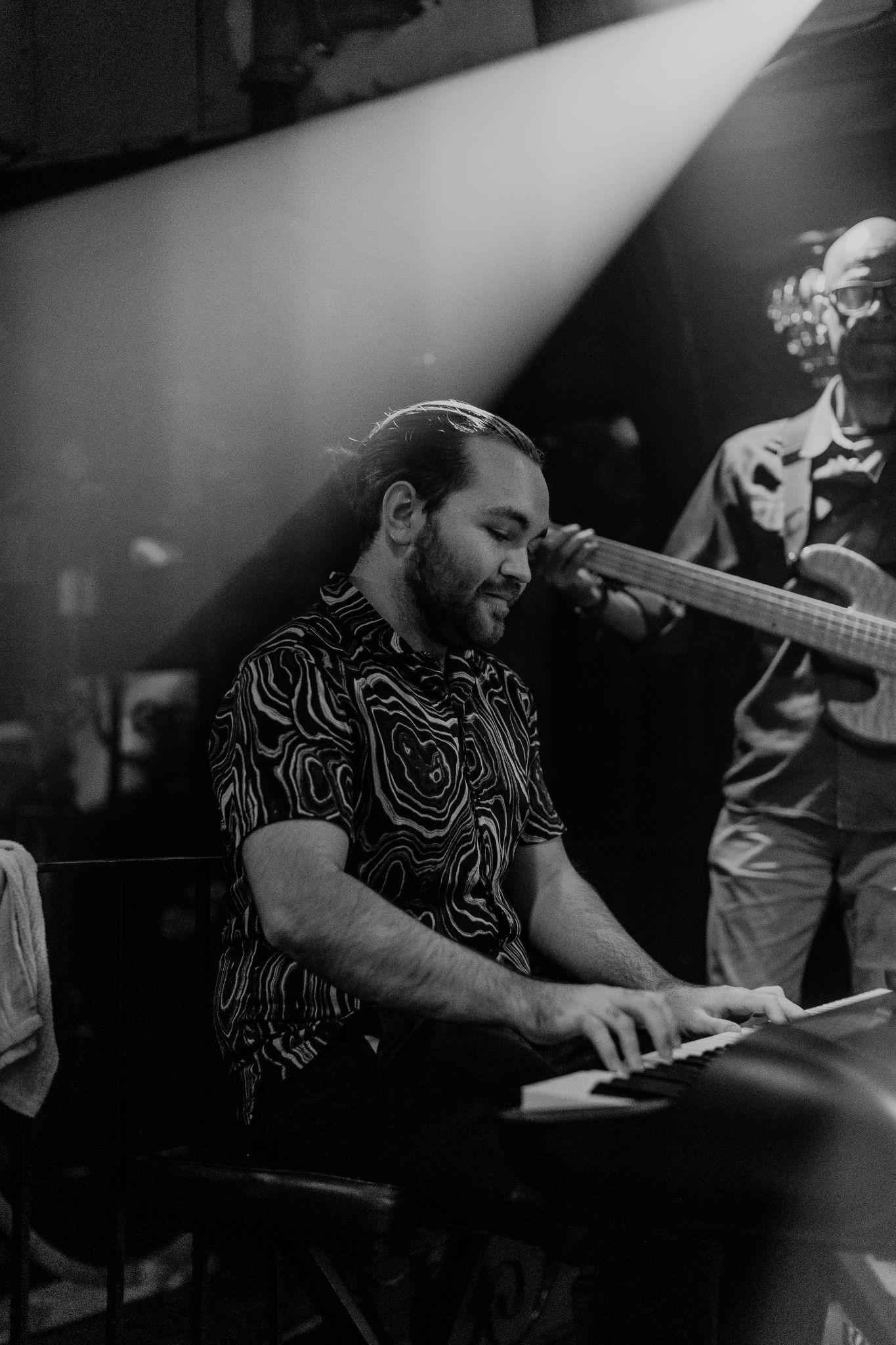 Nolan Tecklenburg performing live at the piano